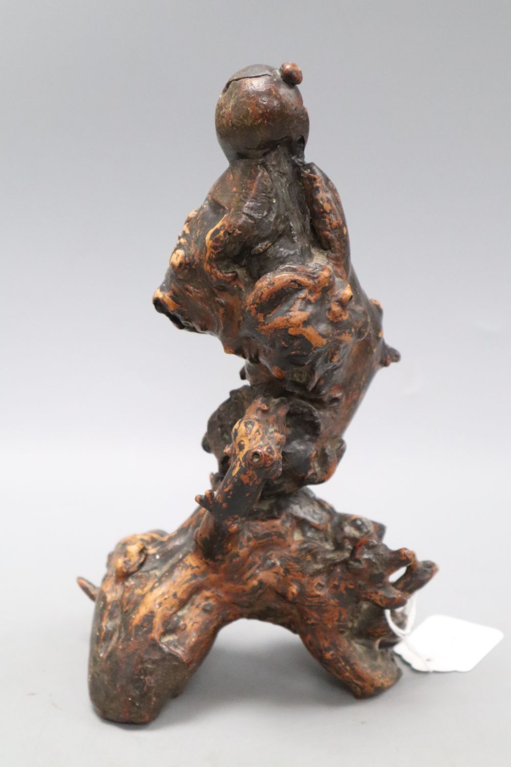 A Chinese rootwood carving of a deity, height 26cm